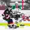 Ottawa Senators' Erik Condra battles with Dallas Stars' Trevor Daley during NHL hockey action at the Canadian Tire Centre in Ottawa, Ontario on January 29, 2015. Errol McGihon/Ottawa Sun/QMI Agency