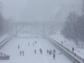 Winter lovers were out skating on the Rideau Canal during a snow storm in Ottawa on Jan 29, 2015.  Tony Caldwell/Ottawa Sun/QMI Agency