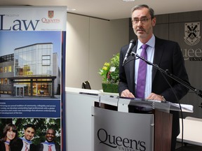Queen's University Faculty of Law Dean Bill Flanagan at the official unveiling of the new Queen's Law Clinics in Kingston on Thursday Jan. 29, 2015. (Steph Crosier/The Whig-Standard)