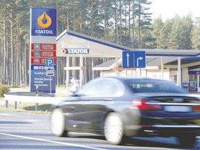 A car passes by a Statoil gas station in Norway. The nation has an enormous oil heritage fund worth well over a trillion dollars. Ken Westcar says Canada should have a similar fund based on reveunes from resource royalties. (Ints Kalnins/Reuters)