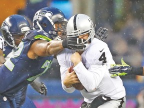 Seahawks defensive end Michael Bennett gets called for one of Seattle’s league-leading 144 penalties this season. (USA TODAY SPORTS)
