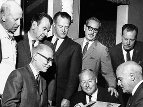 Ted Higginbottom, seated left, and Jack Jennings, standing second from right, were introduced in 1968 to an audience at the Capitol Theatre, St. Thomas attending a screening of the Devil's Brigade. Both St. Thomas men were members of the storied Second World War unit. Also pictured, Robert Manning, Tillsonburg, standing third from right. (Times-Journal collection/Courtesy Elgin County Archives)
