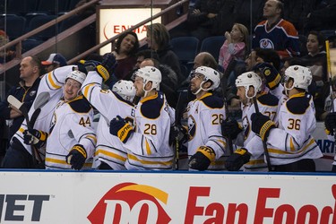 Buffalo Sabres celebrate defenceman Tyler Myers' (57) goal during the first period of a NHL hockey game between the Edmonton Oilers and the Buffalo Sabres at Rexall Place in Edmonton, Alta., on Thursday, Jan. 29, 2015. Ian Kucerak/Edmonton Sun/ QMI Agency