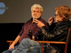 Director George Lucas (L) and Sundance Institute President Robert Redford speak onstage at the Power Of Story Panel during the 2015 Sundance Film Festival at the Egyptian Theatre on January 29, 2015 in Park City, Utah.  Clayton Chase/Getty Images for Sundnace/AFP