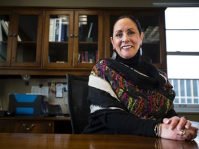 Edmonton Chamber of Commerce President and CEO Janet M. Riopel poses for a photo in her office in Edmonton, Alta., on Thursday, Jan. 29, 2015. The Chamber is undergoing a new branding initiative and Riopel is their new president. She previously sat on the board of directors in 1996. (Ian Kucerak/Edmonton Sun/QMI Agency)