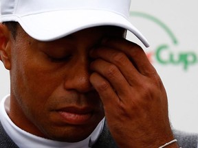 Tiger Woods speaks with the media after finishing 11 over-par for a total of 13 over-par after his second round of the Waste Management Phoenix Open at TPC Scottsdale.  (Sam Greenwood/Getty Images/AFP)
