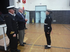 Sherwood Park Resident and Edmonton Sea Cadet CPO2 Catherine Gagnon is well on her way to meeting the Royal Family. On January 27th she received her Gold level pin of the Duke of Edinburgh’s Award from the Honourable David C Dorward and her Commanding Officer Lieutenant (Navy) Jason Finkbeiner, CD.
The Duke of Edinburgh’s Award is designed to challenge youth in four areas: physical fitness, community service, learning a skill, and an expedition, Stoney explained. Gagnon used many of her sea cadet activities to complete the award such as sailing and helping in the community. Now that she has been presented her Gold pin, she will be formally presented her certificate by a member of the Royal Family the next time they visit Canada. Photo Supplied