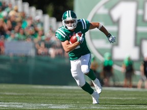 Roughriders slotback Weston Dressler runs up the ball while playing against the Blue Bombers during first half CFL action in Regina on Aug. 31, 2014. (David Stobbe/Reuters/Files)