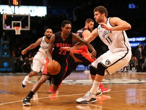 Raptors guard Lou Williams (23) drives around Nets centre Brook Lopez (11) during the second quarter at Barclays Center in Brooklyn, N.Y., on Friday, Jan. 30, 2015. (Anthony Gruppuso/USA TODAY Sports)