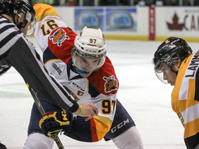 Erie Otters captain Connor McDavid faces off with the Kingston Frontenacs’ Juho Lammikko during the first period of Ontario Hockey League action before a sold-out crowd at the Rogers K-Rock Centre on Friday night. (Julia McKay/The Whig-Standard)
