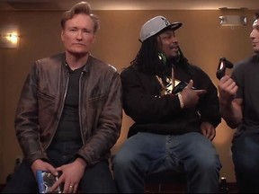Conan O'Brien plays Mortal Kombat X with Marshawn Lynch and Rob Gronkowski during Super Bowl week. (YouTube.com)
