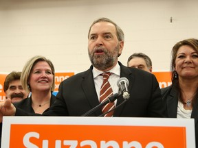 JOHN LAPPA/THE SUDBURY STAR/QMI AGENCYFederal NDP leader Tom Mulcair, middle, addresses NDP supporters during a rally for Sudbury NDP candidate Suzanne Shawbonquit in Sudbury, ON. on Friday, Jan. 30, 2015. Looking on is Ontario NDP leader Andrea Horwath, left, and Suzanne Shawbonquit. Michael Layton, son of the late Jack Layton, the former federal NDP leader, also spoke at the rally.