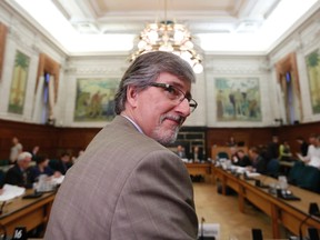 Daniel Therrien pauses after speaking to journalists before testifying at the Commons access to information, privacy and ethics committee on Parliament Hill in Ottawa June 3, 2014. REUTERS/Chris Wattie