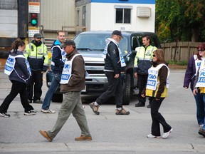 Members of Local 175 of the United Food & Commercial Workers in Brantford are held up at the picket line in front of Good Humor-Breyers Monday, Oct. 21, 2013.
MONTE SONNENBERG/QMI Agency/Simcoe Reformer