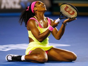 Serena Williams reacts after winning a point against Maria Sharapova during the women's final at the Australian Open in Melbourne January 31, 2015. (REUTERS/Athit Perawongmetha)
