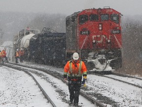 A CN Rail freight train derailed in Richmond Hill Saturday afternoon. Two cars came off the tracks north of Elgin Mills Rd., east of Yonge St., but did not tip over and no injuries were reported. (Chris Doucette/Toronto Sun)