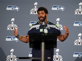 Seattle Seahawks quarterback Russell Wilson talks to reporters during the Seattle Seahawks press conference at Arizona Grand. (Peter Casey-USA TODAY Sports)