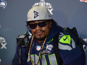 Seattle Seahawks running back Marshawn Lynch (24) at press conference at Arizona Grand in advance of Super Bowl XLIX. (Kirby Lee-USA TODAY Sports)