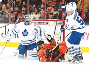 Leafs defenceman Jake Gardiner knocks Flyers' Petr Straka into James Reimer's crease on Saturday. The Leafs lost 1-0. (USA TODAY)