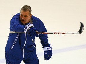 Maple Leafs interim coach Peter Horachek makes a point during the team’s workout on Jan. 26, 2015. He wants his players to “create more traffic” in front of the opposition’s net. (DAVE ABEL/Toronto Sun files)