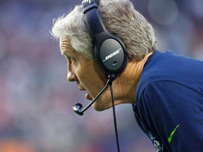 Seattle Seahawks head coach Pete Carroll calls plays against the New England Patriots during the NFL Super Bowl XLIX football game in Glendale, Arizona, February 1, 2015. (REUTERS/Lucy Nicholson)