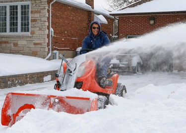Toronto resident Lou Lasorda, 69, has been waiting all winter for a nice snow to try out his new Kubota snowblower on Monday February 2, 2015. (Dave Thomas/QMI Agency)