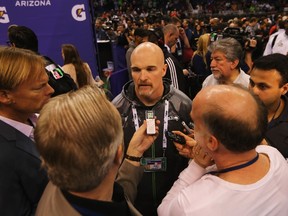 Defensive coordinator Dan Quinn of the Seattle Seahawks addresses the media at Super Bowl XLIX Media Day inside U.S. Airways Center on January 27, 2015 in Phoenix. (Elsa/Getty Images/AFP)