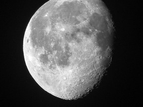 The moon is seen above Edmonton, Alberta on May 18, 2014. Max Maudie/Edmonton Sun/QMI Agency