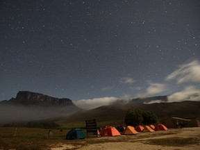 Kukenan (L) and Roraima mounts are seen from the Tec Camp, near Venezuela's border with Brazil January 14, 2015.  REUTERS/Carlos Garcia Rawlins