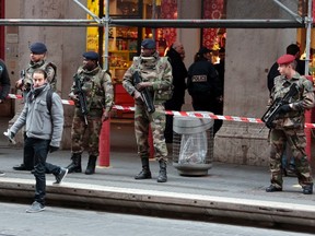 French soldiers stand guard outside a Jewish Community centre, where two French soldiers were attacked and wounded in a knife attack in Nice February 3, 2015. (REUTERS/Eric Gaillard)