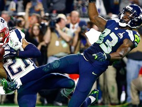 New England Patriots strong safety Malcolm Butler intercepts a pass intended for Seattle Seahawks wide receiver Ricardo Lockette in the fourth quarter in Super Bowl XLIX. (REUTERS/Mark J. Rebilas)