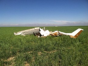 The wreckage of a crashed Cessna 150 airplane lies in a field near Watkins, Colorado on May 31, 2014. The pilot of a small plane was taking selfie pictures with a cellphone on a series of short flights around a Colorado airport in 2014 before he crashed on one of the jaunts, killing himself and a passenger, federal investigators found. The National Transportation Safety Board said the 29-year-old pilot of the Cessna 150K plane lost control in the crash near Watkins, Colorado. (REUTERS/Sgt Aaron Pataluna/Adams County Sheriff/handout via Reuters)