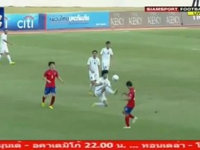 Jaloliddin Masharipov of Uzbekistan is seen here flying through the air before kicking the chest of South Korea's Kang Sang-woo during a soccer tournament in Thailand. (YouTube.com)