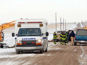 An ambulance leaves the scene of a work site accident on Feb. 3 after a Champion resident was hit by the bucket on a backhoe during culvert work on a range road east of the village. The 51-year-old male, who was not seriously injured, was taken to the Vulcan Community Health Centre.