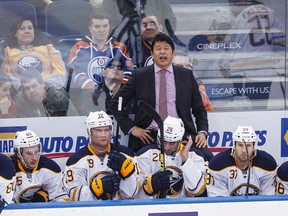 Buffalo head coach Ted Nolan calls to the referee during the third period of a NHL hockey game between the Edmonton Oilers and the Buffalo Sabres at Rexall Place on Jan. 29, 2015. (Ian Kucerak/Edmonton Sun/ QMI Agency)