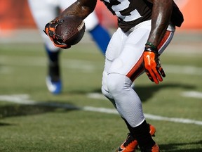 Josh Gordon #12 of the Cleveland Browns carries the ball during the first quarter against the Indianapolis Colts at FirstEnergy Stadium on December 7, 2014 in Cleveland, Ohio.  Joe Robbins/Getty Images/AFP