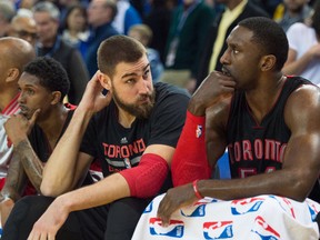 When the Raptors opposition goes small, Jonas Valanciunas (left) often finds himself on the bench because he is not capable of covering the quicker players in the league. (USA TODAY)