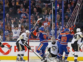 The Edmonton Oilers celebrate a third period goal by forward Ryan Nugent-Hopkins (93) against the Pittsburgh Penguins at Rexall Place, Jan 10, 2014. (Perry Nelson-USA TODAY Sports)