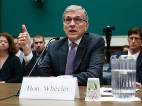 U.S. Federal Communications Commission chairman Tom Wheeler testifies before a House Energy and Commerce Communications and Technology Subcommittee hearing on oversight of the FCC on Capitol Hill in Washington May 20, 2014. REUTERS/Jonathan Ernst