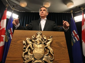 Premier Jim Prentice announces that cabinet will take a 5% pay cut during a news conference at the Alberta Legislature in Edmonton, Alberta on Thursday Jan.29, 2015. (Perry Mah/Edmonton Sun/QMI Agency)