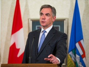 Alberta Premier Jim Prentice takes questions after a Progressive Conservative Party caucus meeting at Government House in Edmonton, Alta., on Wednesday, Jan. 28, 2015.  Ian Kucerak/ QMI Agency