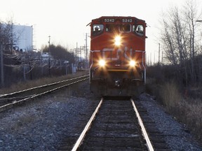 A Canadian Pacific freight train sits idle on the tracks heading northbound along 17 St., just south of Petroleum Way in Edmonton on January, 9, 2012. TOM BRAID/EDMONTON SUN