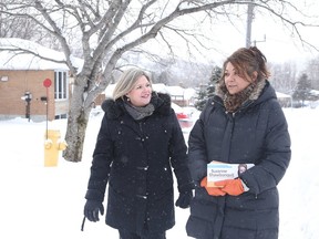 Ontario NDP leader Andrea Horwath and candidate Suzanne Shawbonquit, campaign in the Sudbury byelection on Feb. 4, 2015. (Gino Donato/QMI Agency)