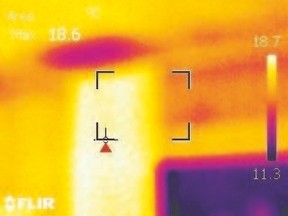 The dark spot in this image from an infrared camera of the ceiling of a room below an attic shows where insulation is missing. The gap in insulation allows warm air to enter the attic, creating the conditions for ice damming.