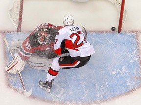 Ottawa Senators Curtis Lazar scores on breakaway against New Jersey Devils goalie Cory Schneider at the Prudential Center Tuesday, Feb. 3, 2016. It was just his second goal of the season. (Jim O'Connor-USA TODAY Sports)