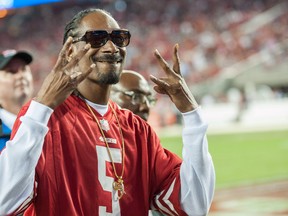 Snoop Dogg reacts to the crowd after performing during the halftime show at Levi's Stadium. (Ed Szczepanski/USA TODAY Sports)