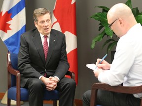 Toronto Mayor John Tory meets with Toronto Sun Reporter Shawn Jeffords at City Hall on Feb. 4, 2015. (Veronica Henri/Toronto Sun)