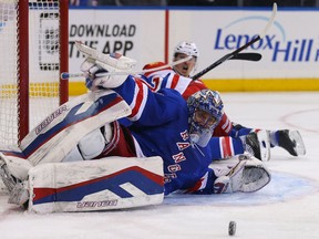 New York Rangers goalie Henrik Lundqvist makes a save against the Florida Panthers during NHL play Feb. 2, 2015 at Madison Square Garden. (Adam Hunger/USA TODAY Sports)