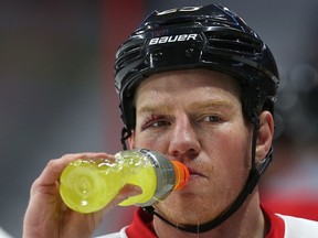 Senators veteran Chris Neil takes a break from practice Wednesday, Feb. 5, 2015, at the Canadian Tire Centre. (Tony Caldwell/Ottawa Sun)