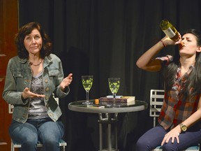 Kathleen Morrison (left) as Cheryl and Aleen Kelledjian as Betty rehearse a scene from Mike Wilmot's Buying the Moose at the Palace Theatre (photo courtesy of Ross Davidson).